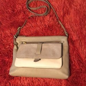 Fossils Ryder tan color crossbody purse